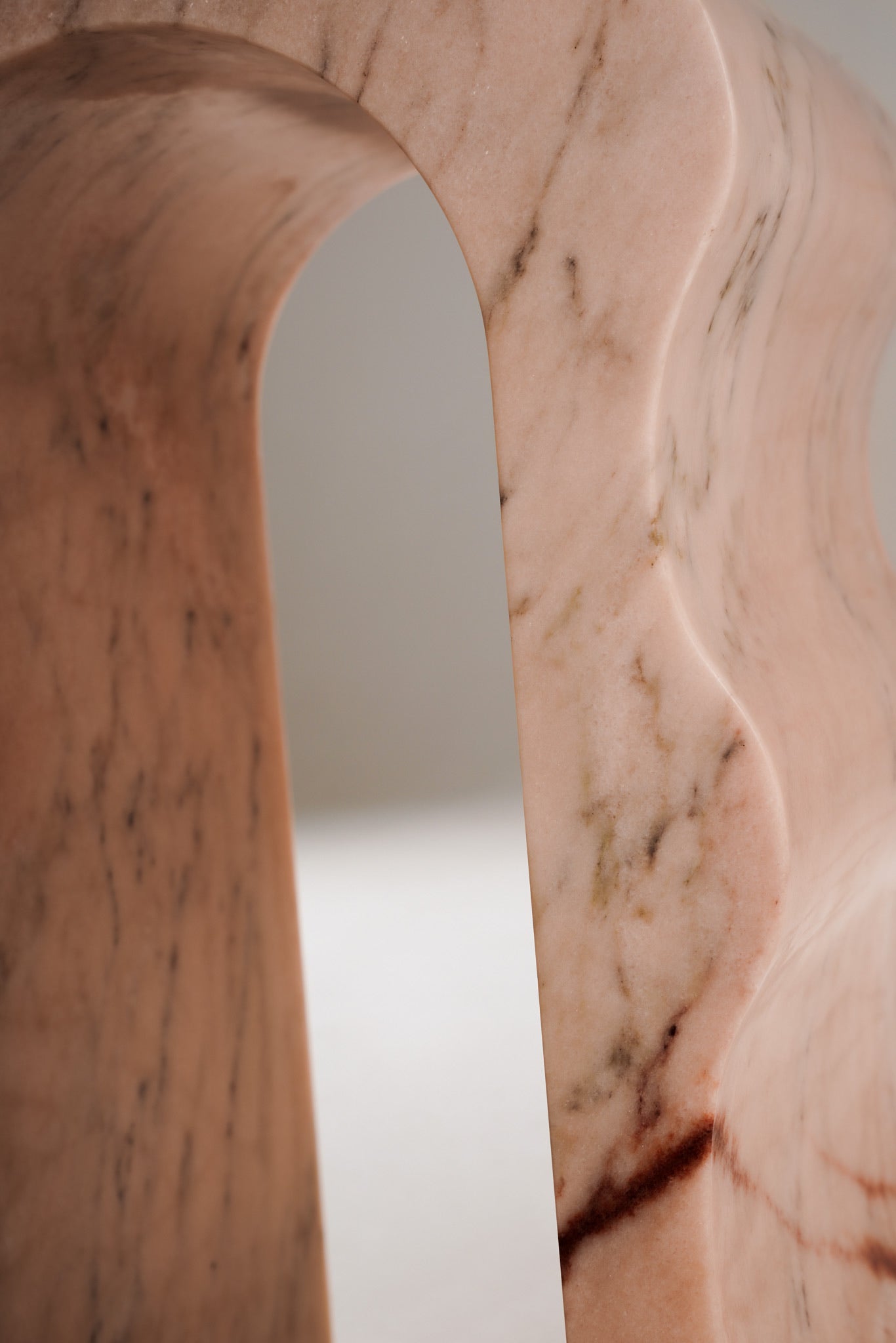 Top surface detail of Stine Stool 01 – polished Rosa Aurora marble